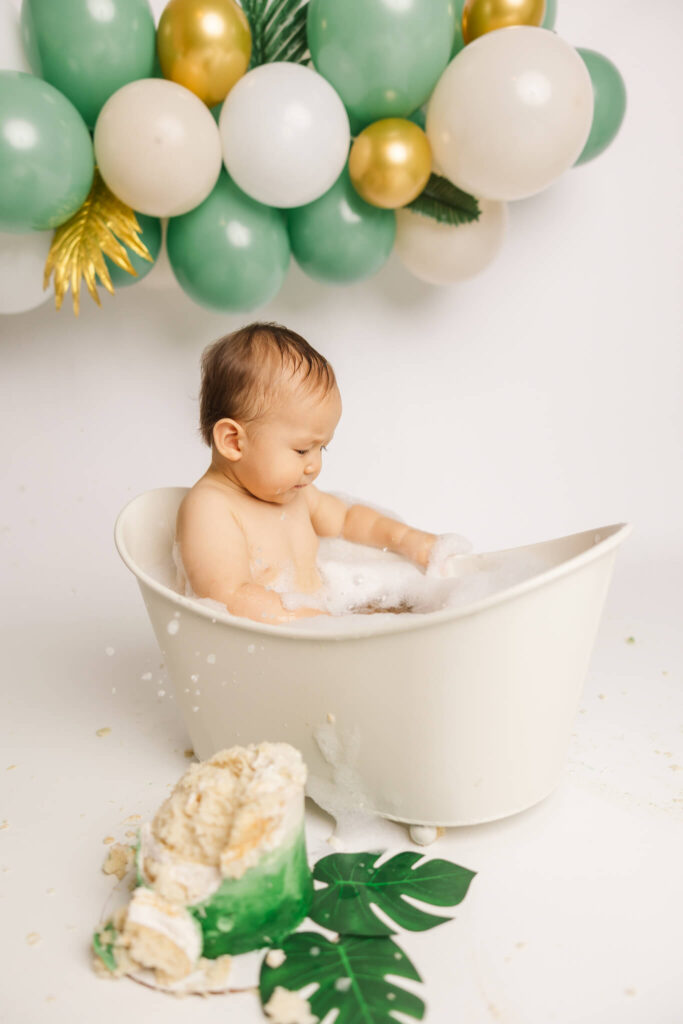 One year old enjoying his bubble bath at the end of his cake smash photo session by the augusta cake smash photographer molly berry
Custom Cakes in Augusta GA