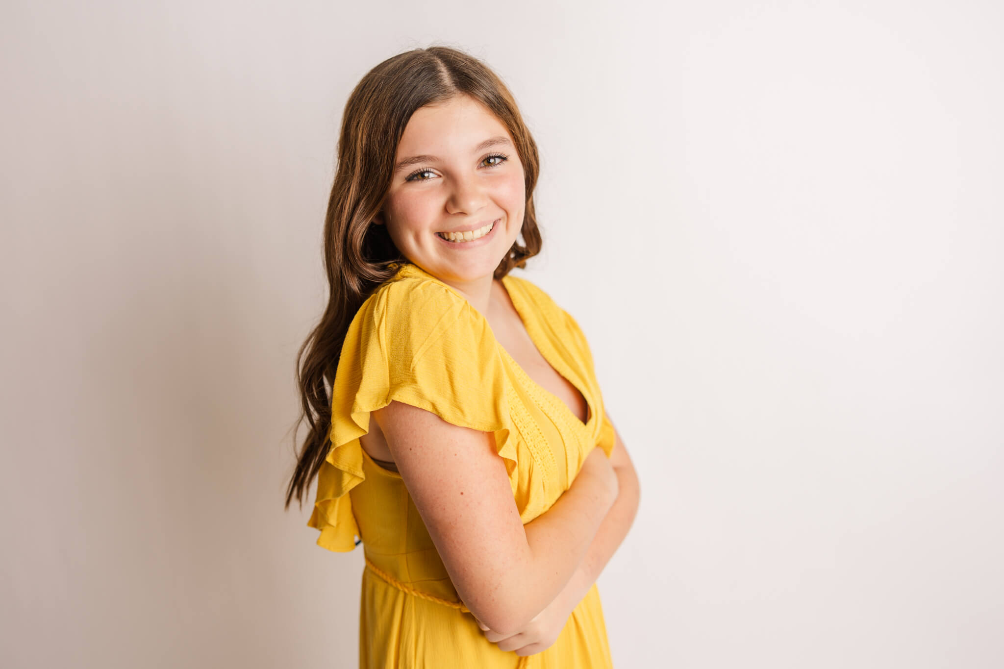 13 year old girl laughing during her milestone photography session