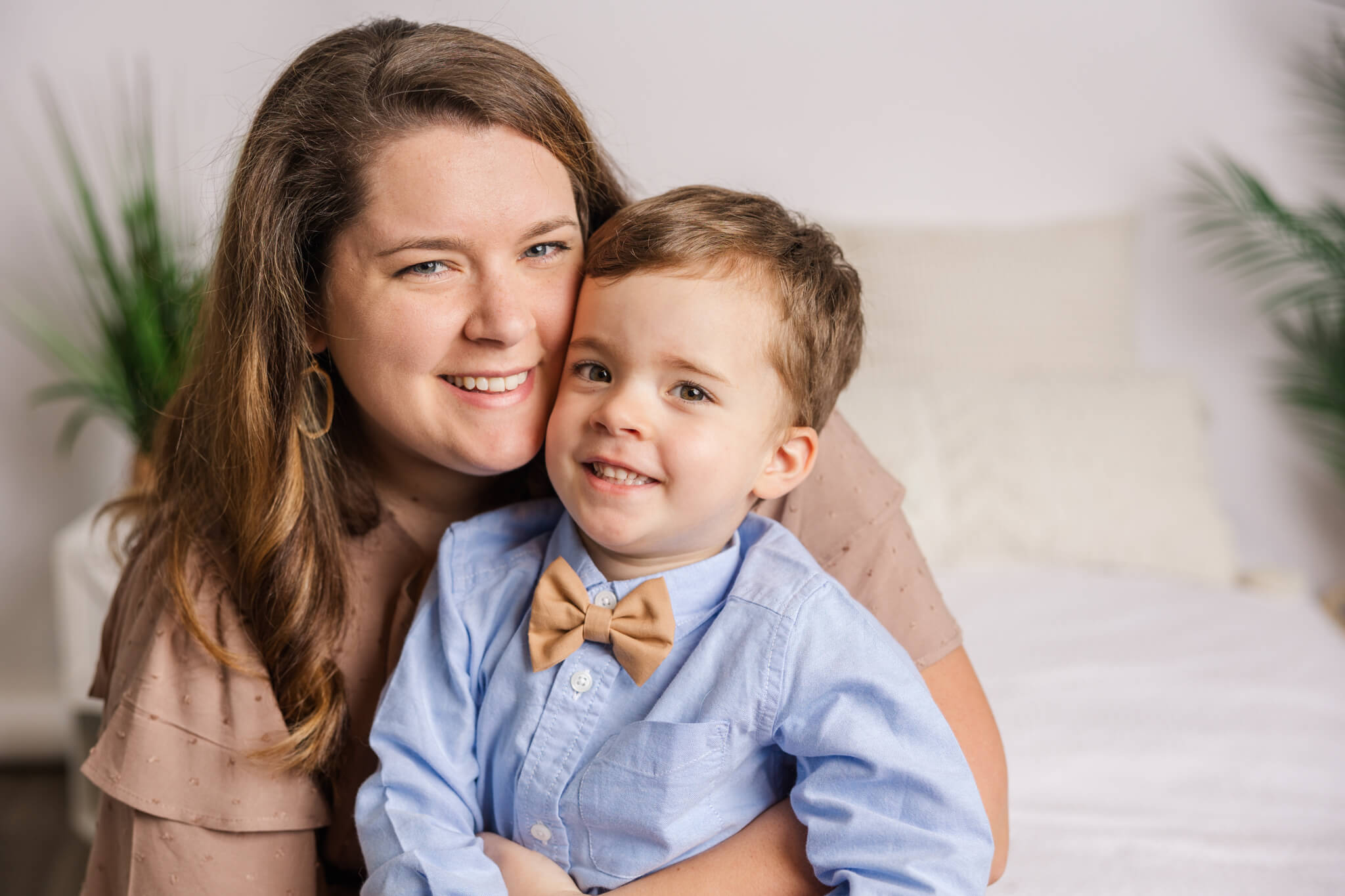 Mom and son sharing a sweet smile during their motherhood session in the studio by molly berry photography. Cudos2U