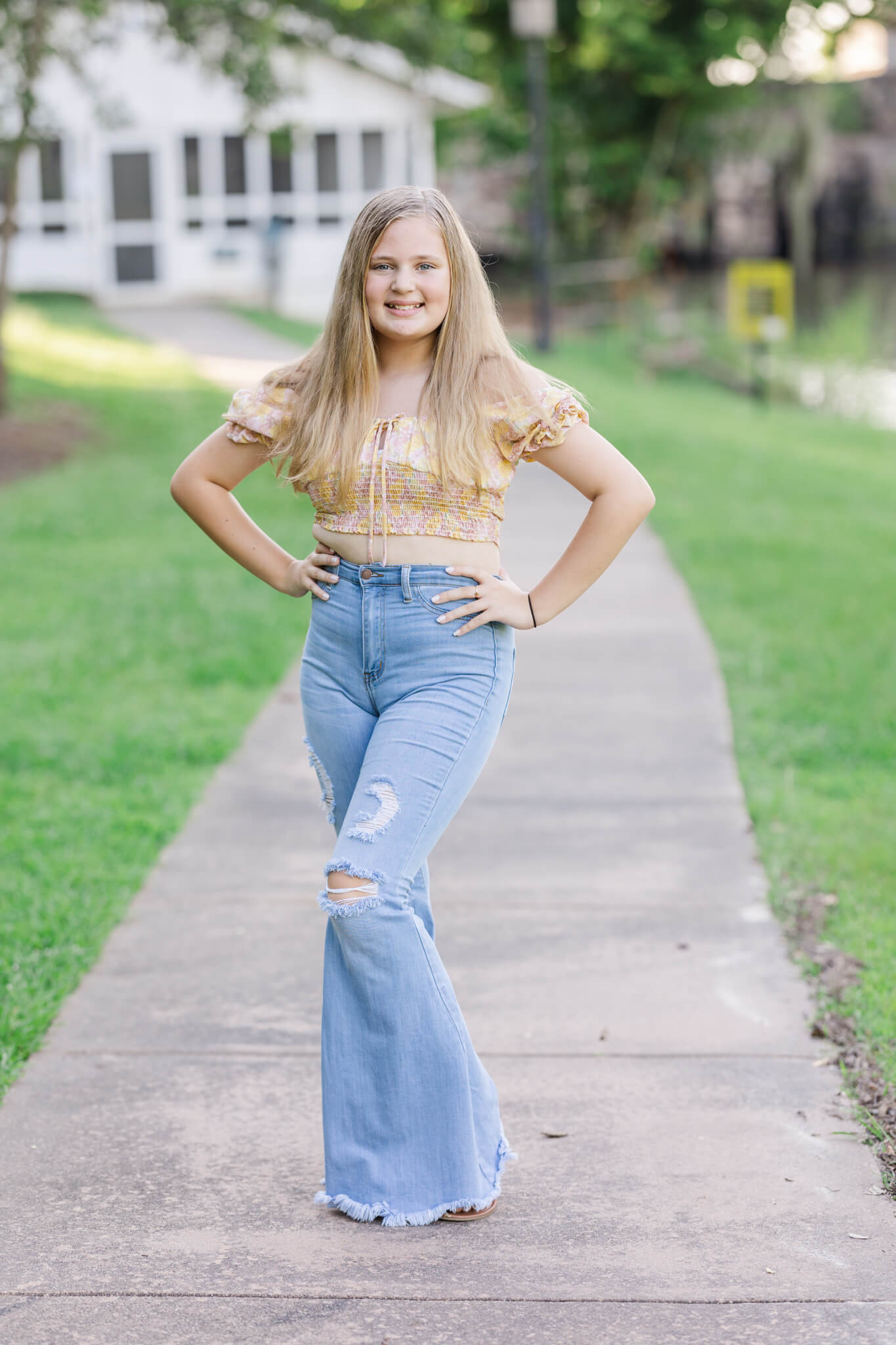 girl in yellow shirt and jeans capturing a pose alone during her sibling session at the savannah rapids.

private schools in augusta ga