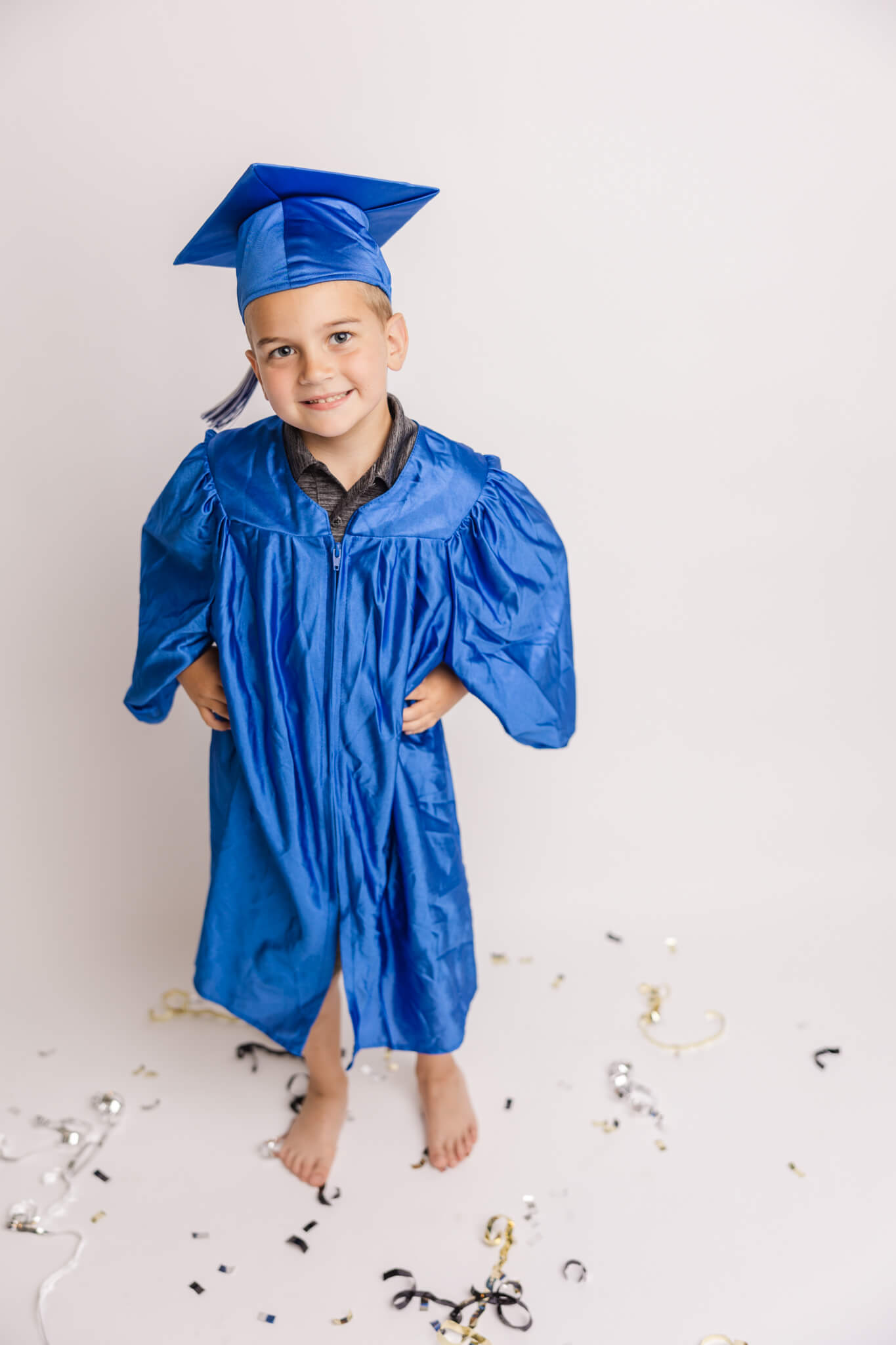 Celebrating the completion of his four year old preschool program captured by molly berry photography. 