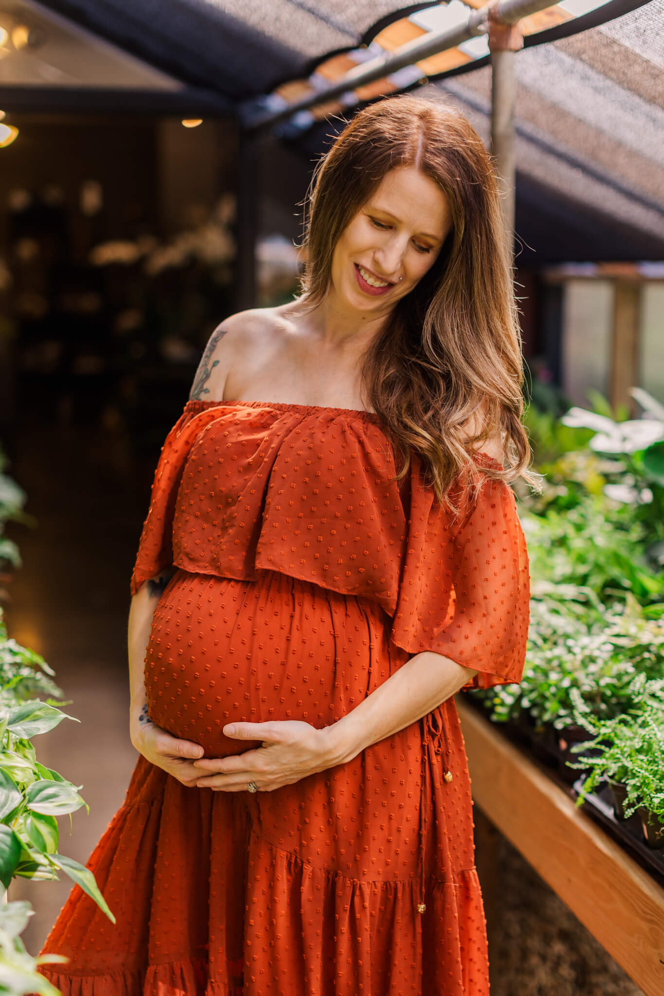 Expecting mom capturing her maternity portraits wearing a burnt orange baltic born dress from my client closet. Photo captured by molly berry photography.
obgyn augusta ga