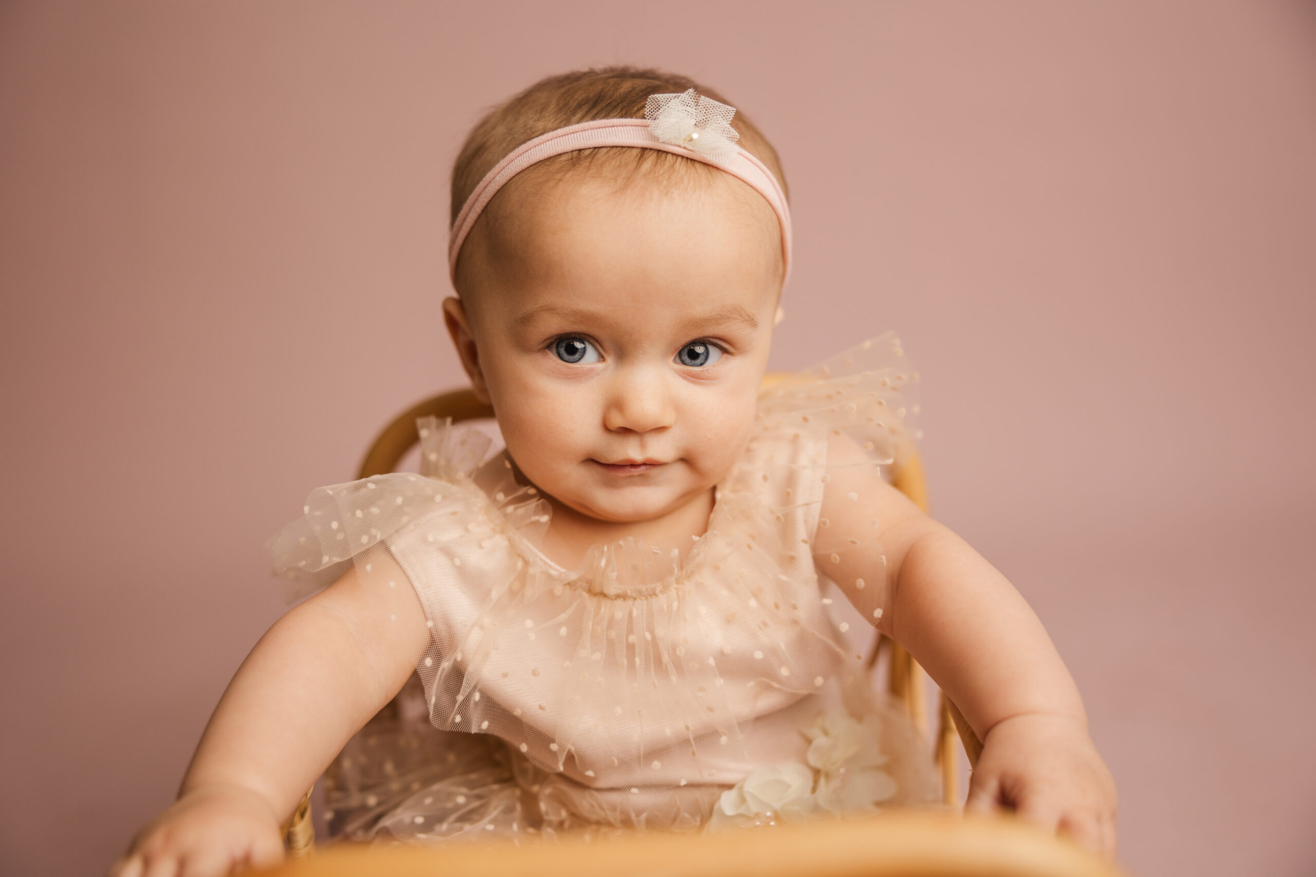 6 month old baby girl during her milestone session in the studio. 
Buy Buy Baby Augusta