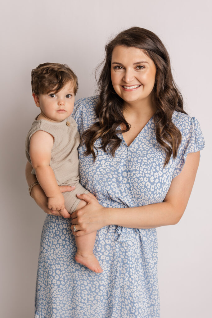 One Year old baby boy with his mom during his one year cake smash photo session