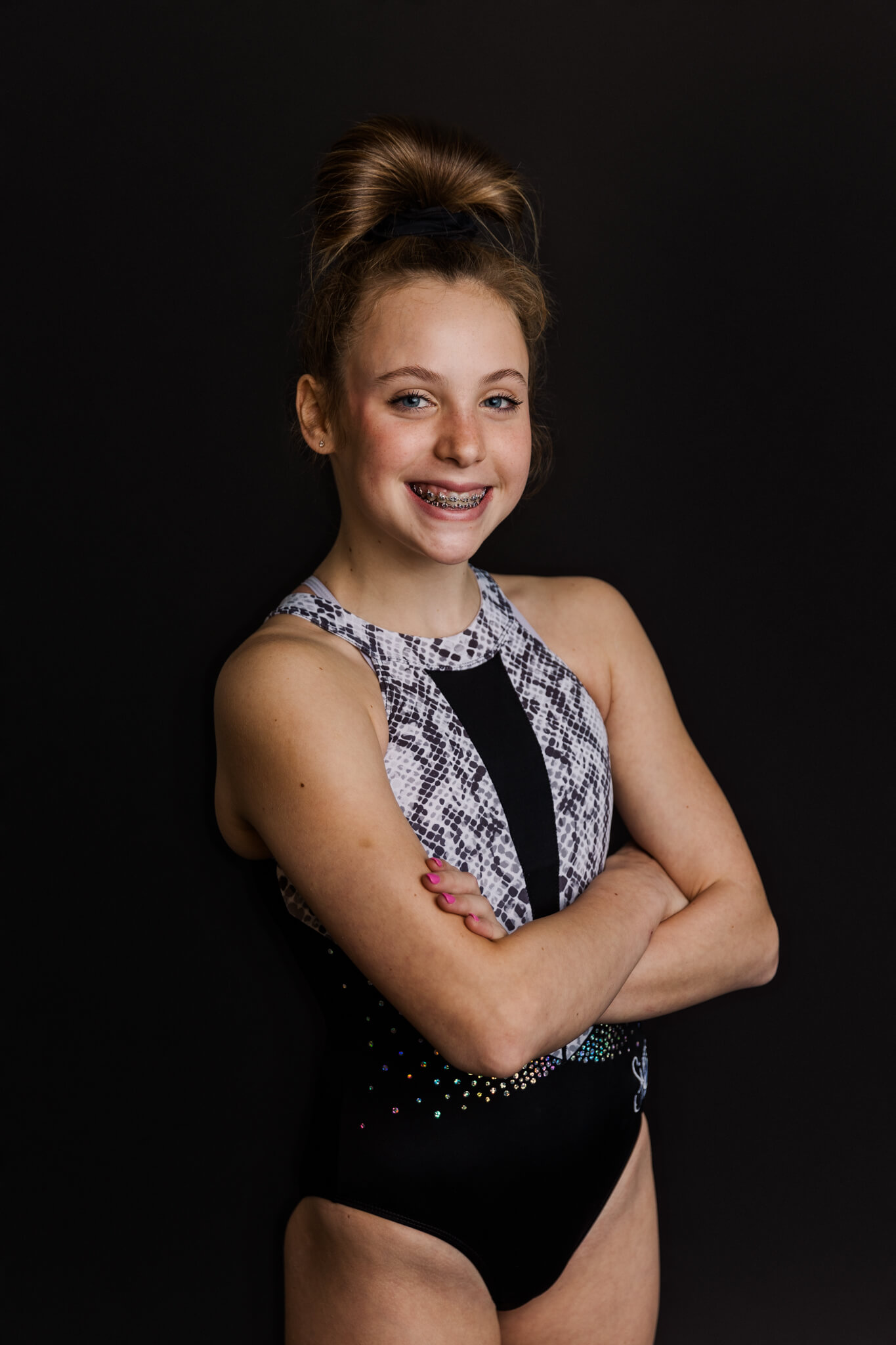 Girl gymnast in black leotard with her arms crossed C&C Gymnastics Augusta GA