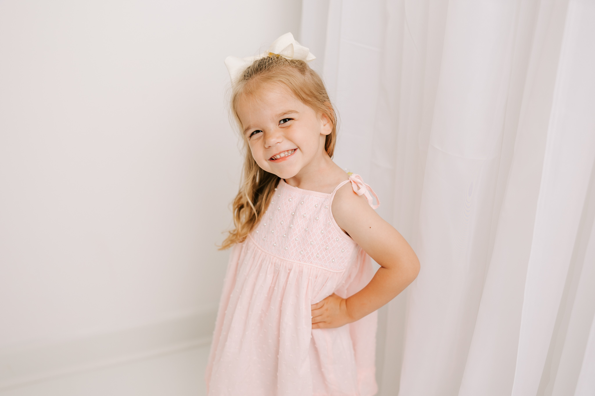 All sassiness from this 3 year old during her milestone session.