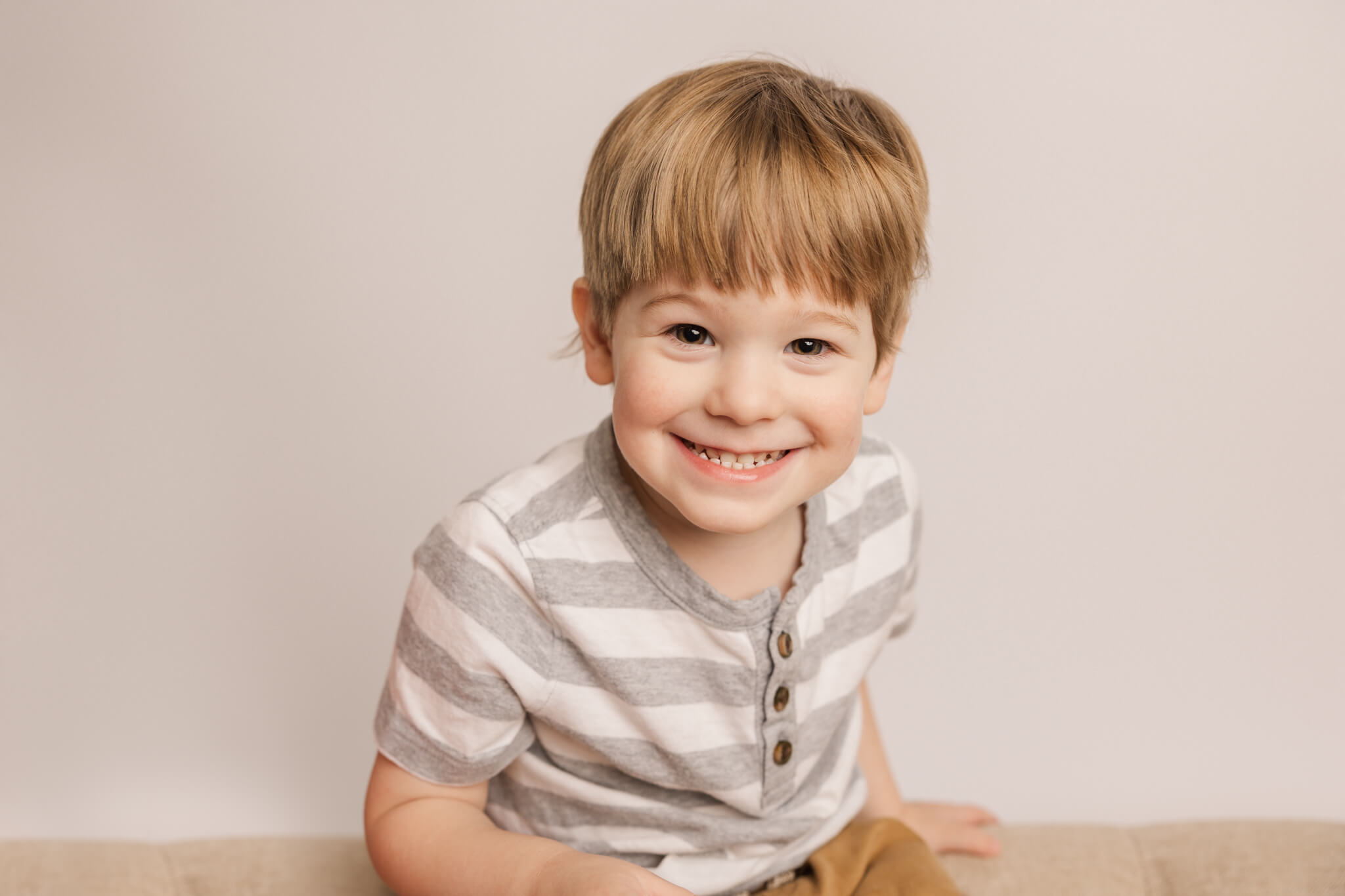 4 year old boy capturing milestone portraits in the studio of Molly Berry Photography
