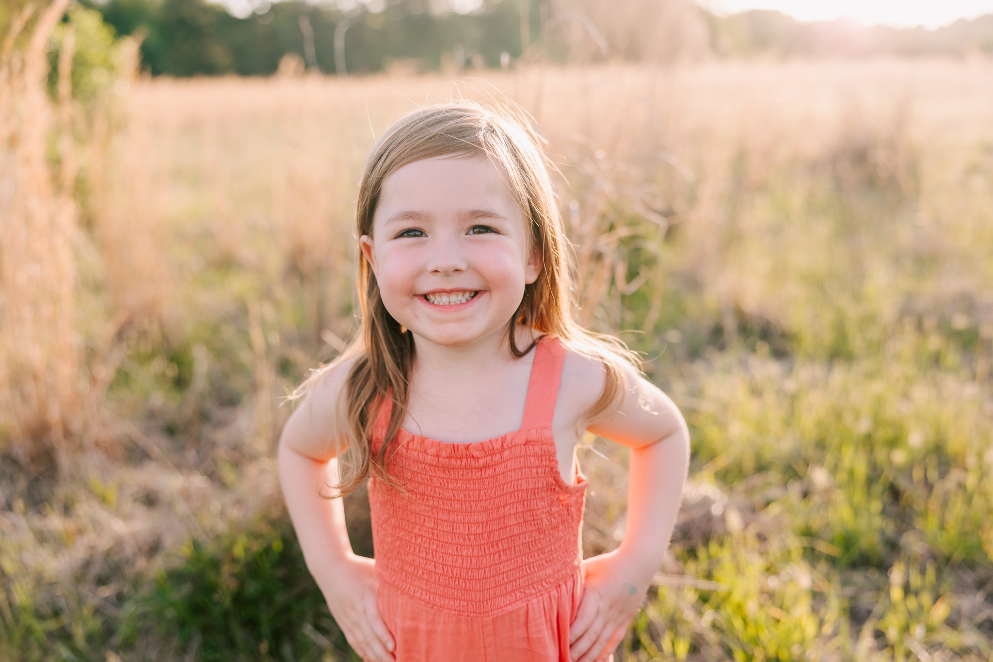 5 year old girl spinning around during her augusta family session. 