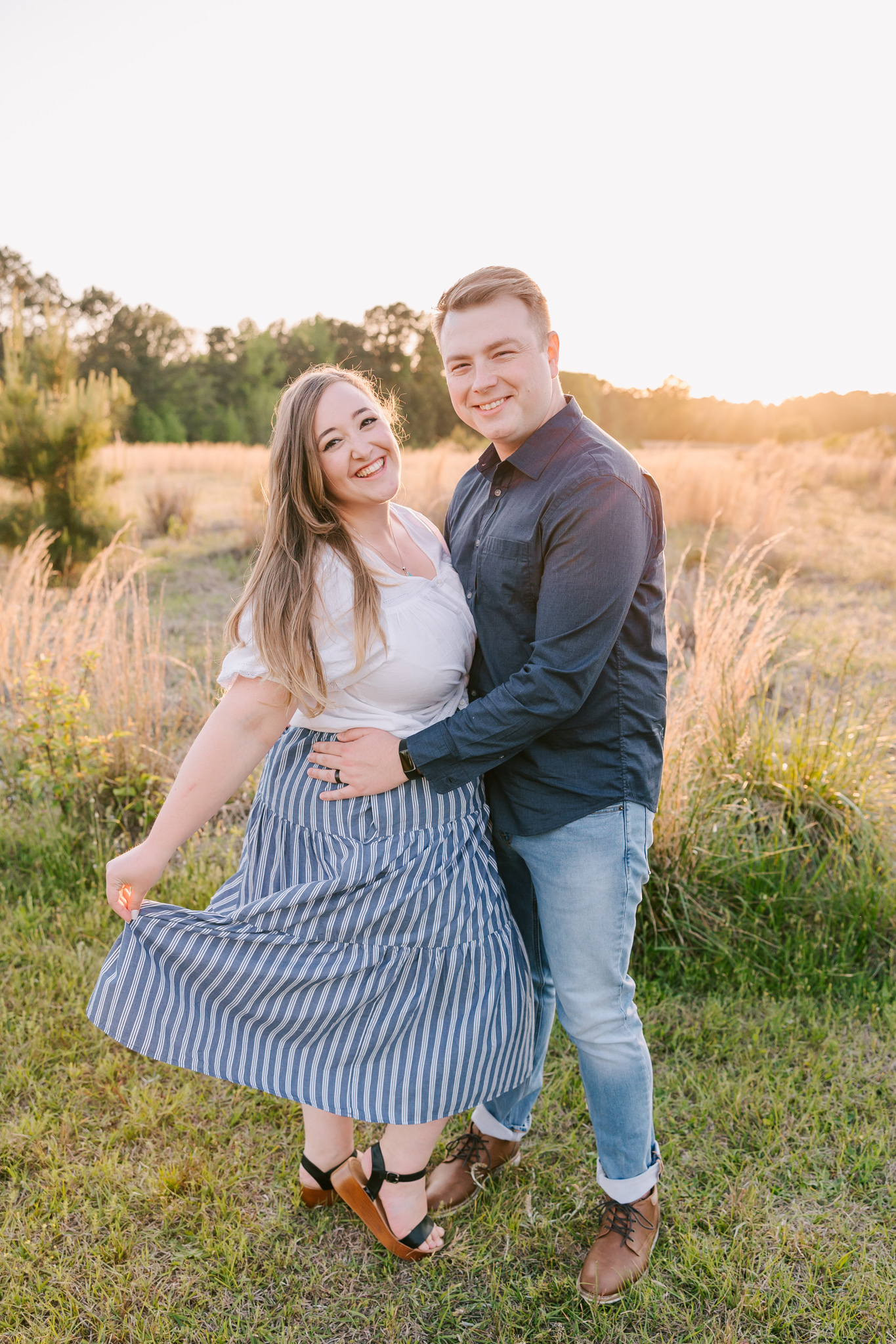 couple sharing a moment together during their augusta family session in Evans, GA