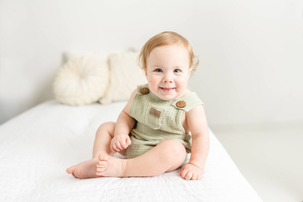 Smiling baby boy during a studio session with Molly Berry.