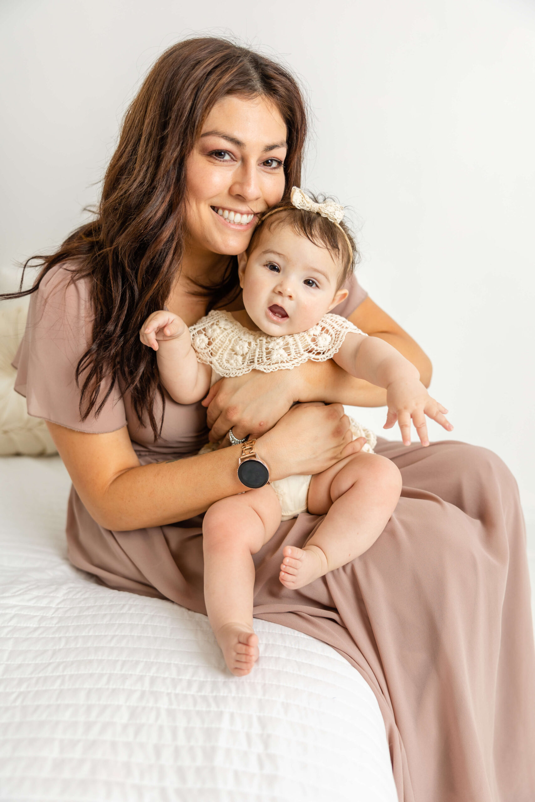 Captured close up image of mom and her baby girl during their motherhood session. 