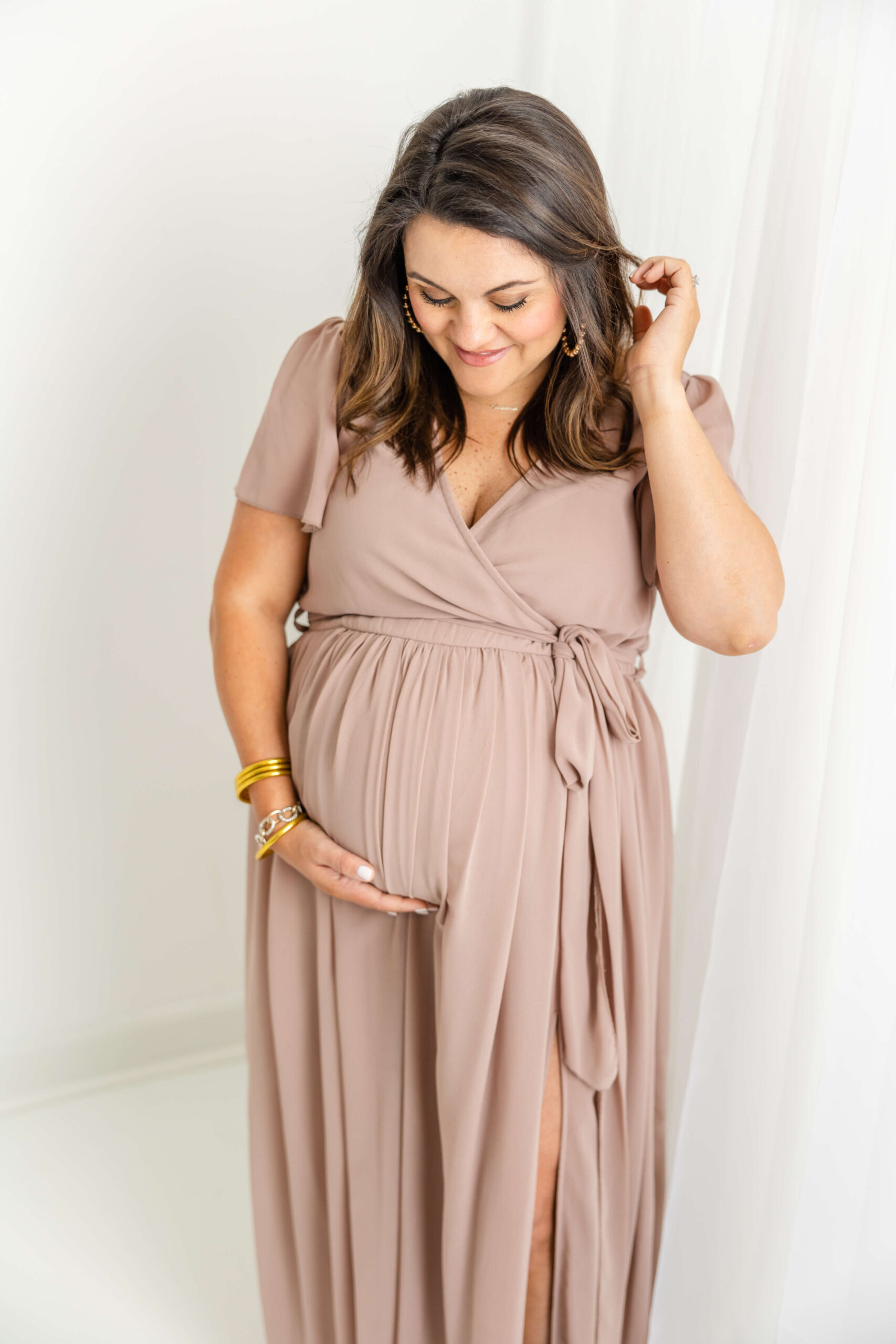 Soon to be mom in mauve dress. Local Places to Host a Baby Shower in Augusta