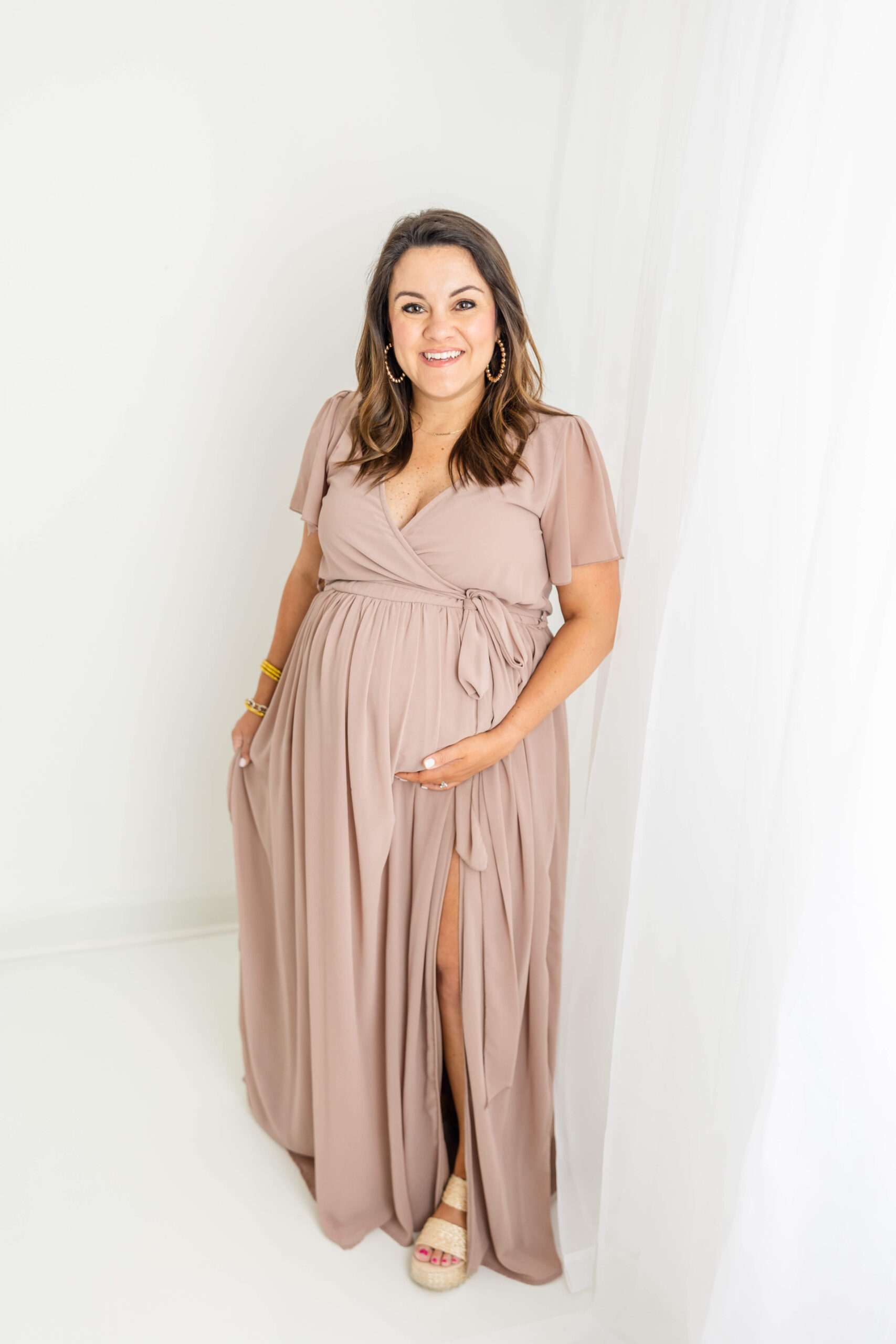 Pregnant mom captured during studio maternity session.