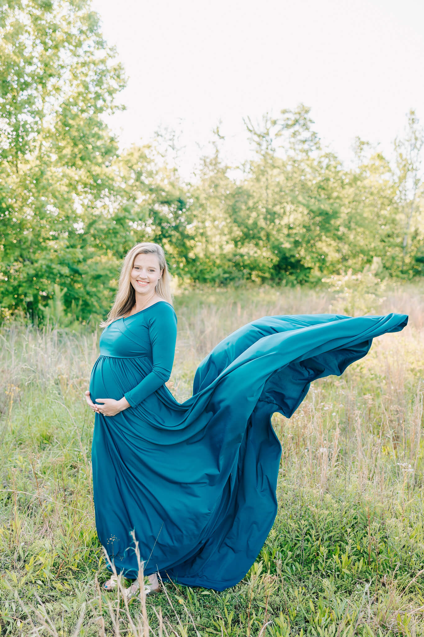 Mom shares a smile during her columbia sc maternity session. 