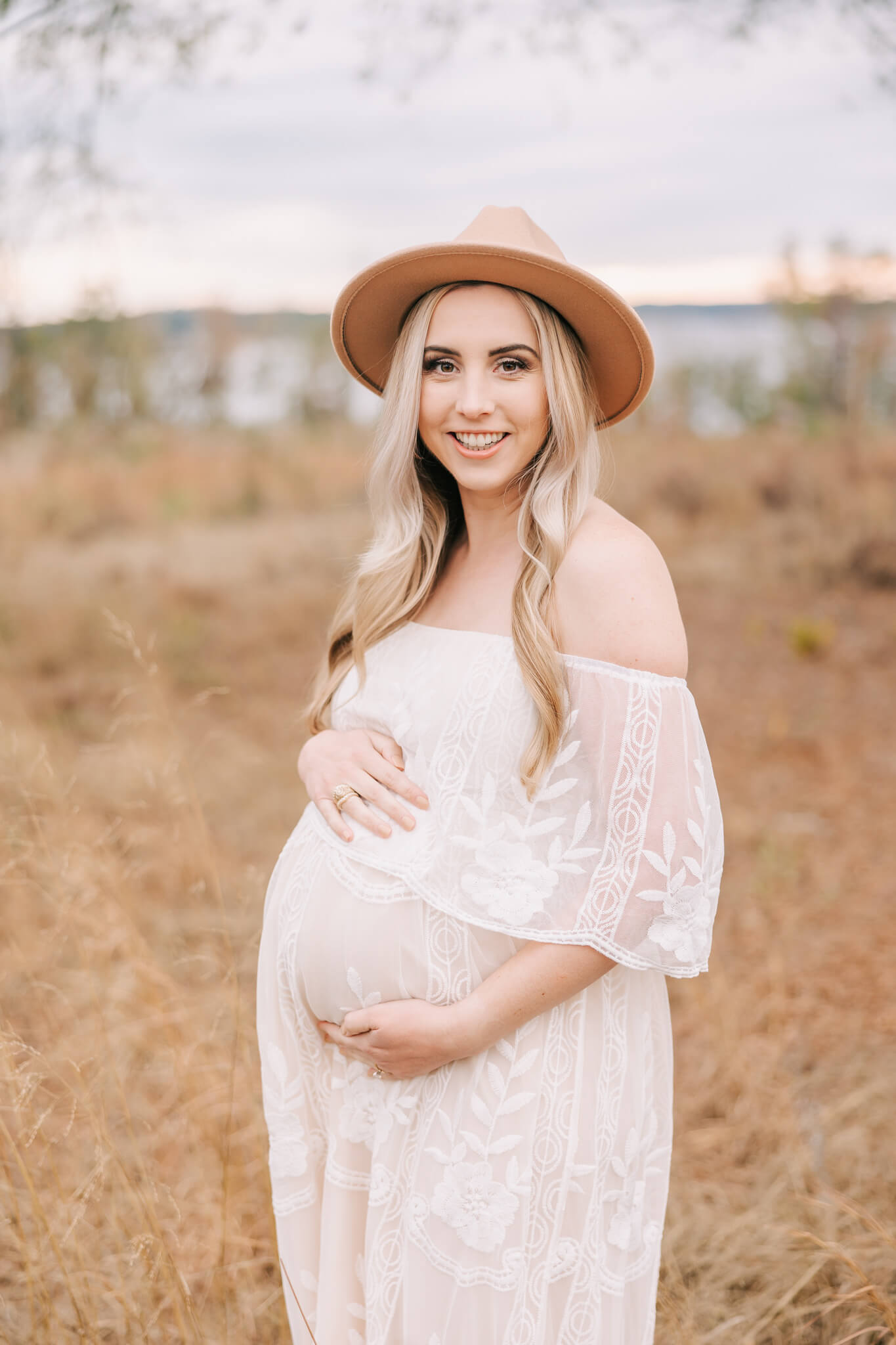 Pregnant mom capturing her maternity portraits with molly berry photography.
