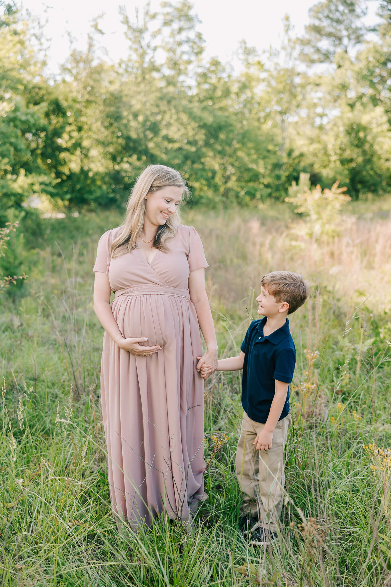 Mom and son are sharing a smile during their atlanta maternity photography session with molly berry photograpahy.