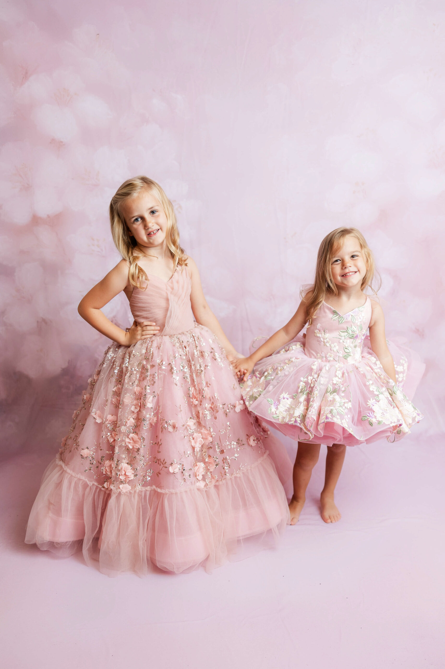 Sisters enjoying a fine art session in the studio.