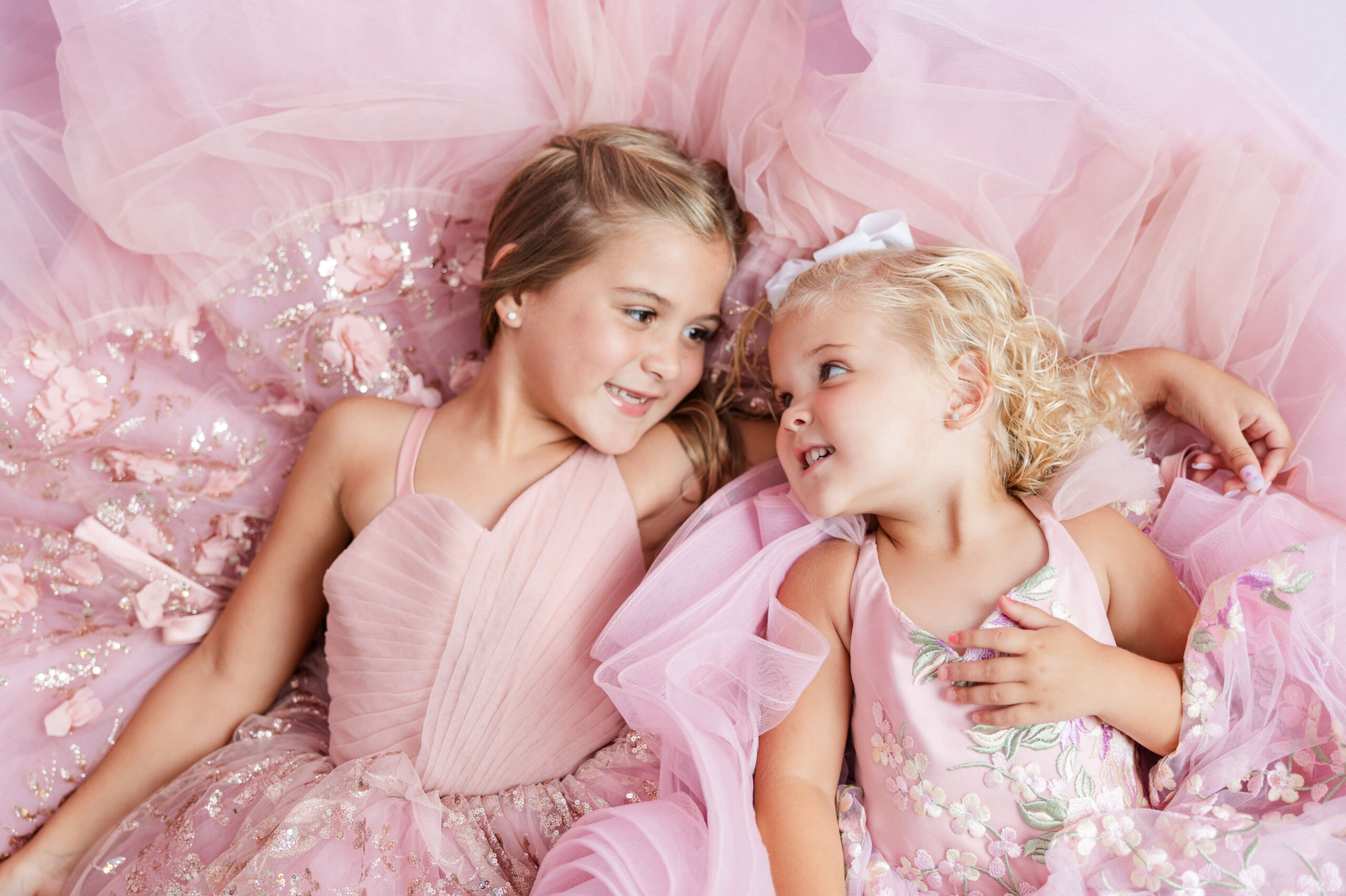 sisters looking at each other during a studio session with Molly Berry.