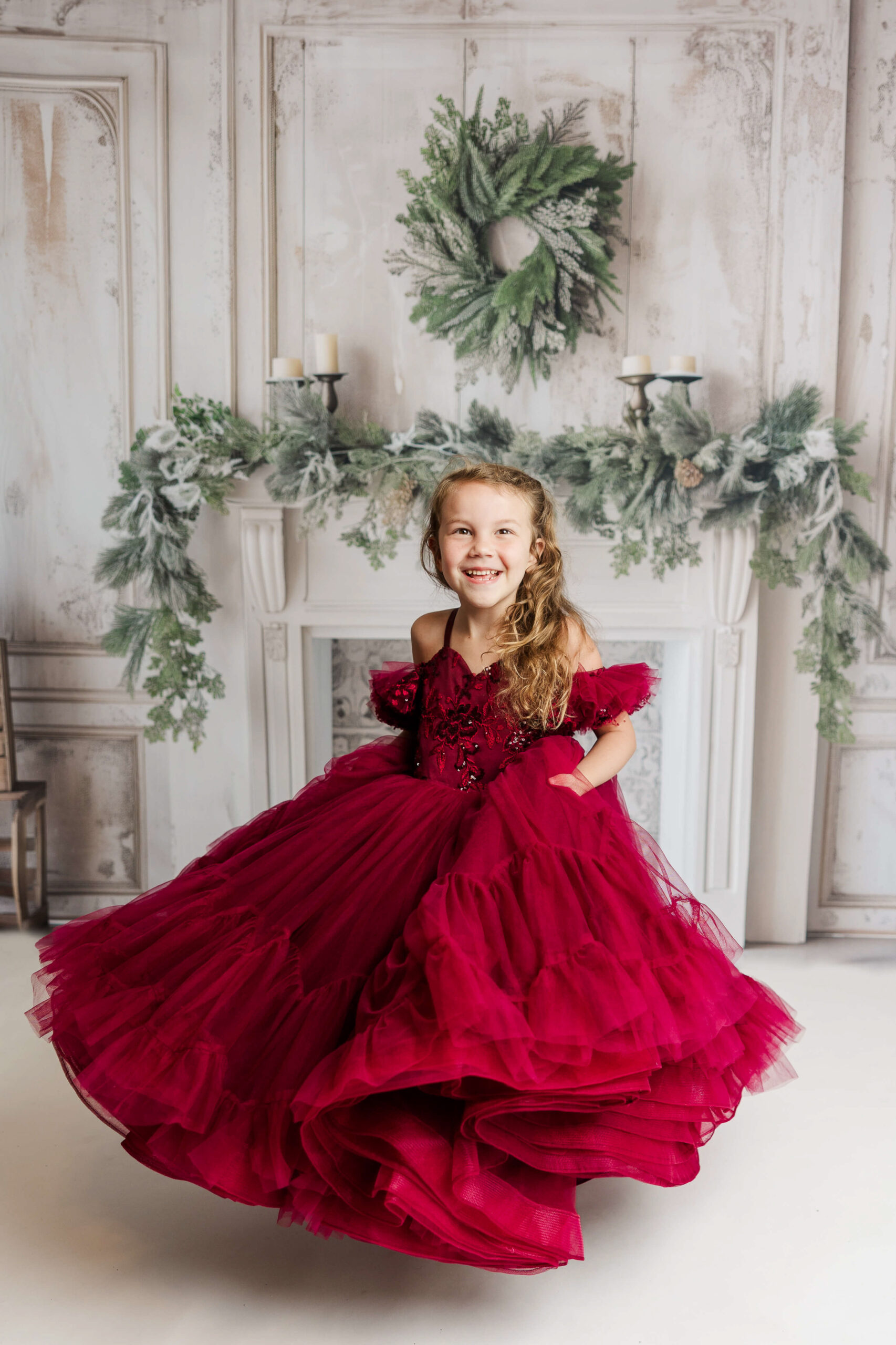 Young girl in red dress during fine art session with Molly Berry